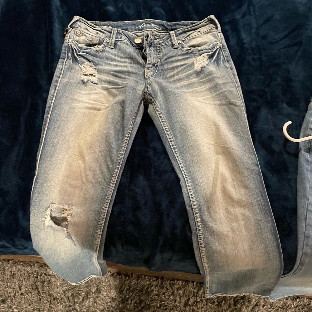 Ripped blue jeans